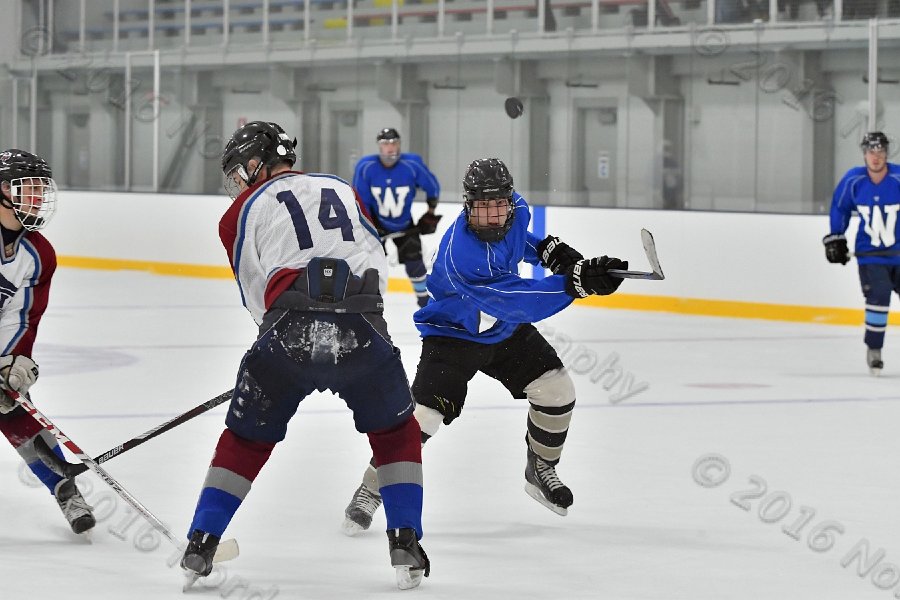 Wheaton College Men\'s Ice Hockey vs Middlesex Community College. - Photo By: KEITH NORDSTROM